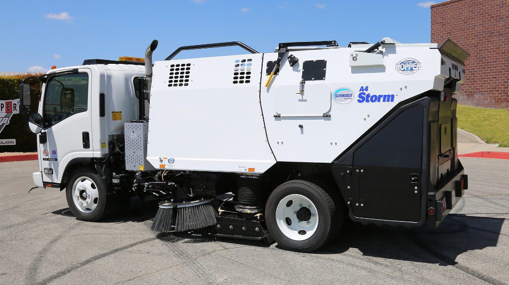 Schwarze A4 Storm compact regenerative air street sweeper operating on a municipal road.